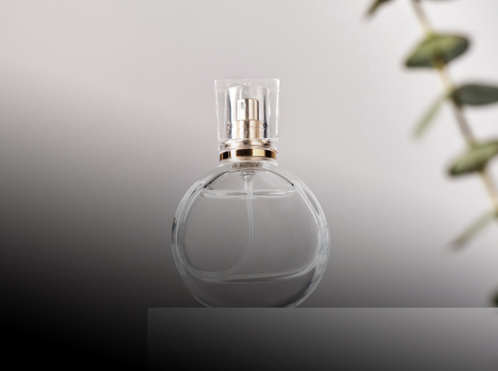 A clear glass bottle of natural fragrance from Shop Small Collective